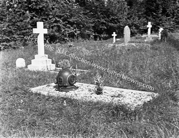 CHURCHYARD 'QUEER' TOMBSTONE (DIVER'S MASK)